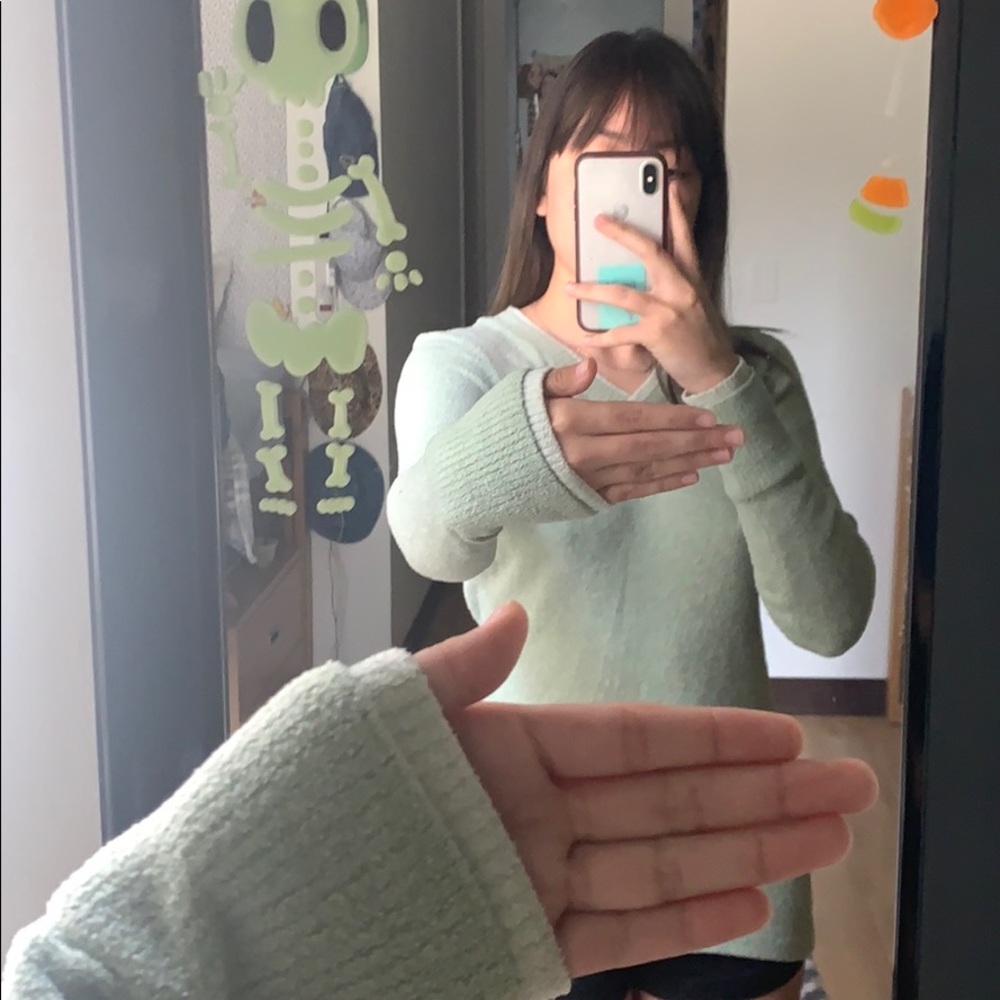Light green sweater